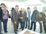 Şenol Bektaş and Uğurçan Akyüz admiring the ceramic art work